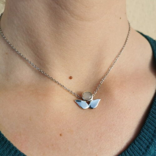 wings collection neckless wearing a pink chalazias stone