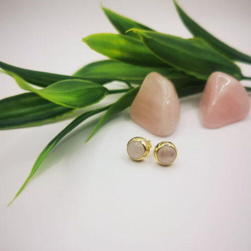 pure beauty collection earrings whearing a pink chalazias stone